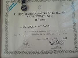 Medalla y diploma